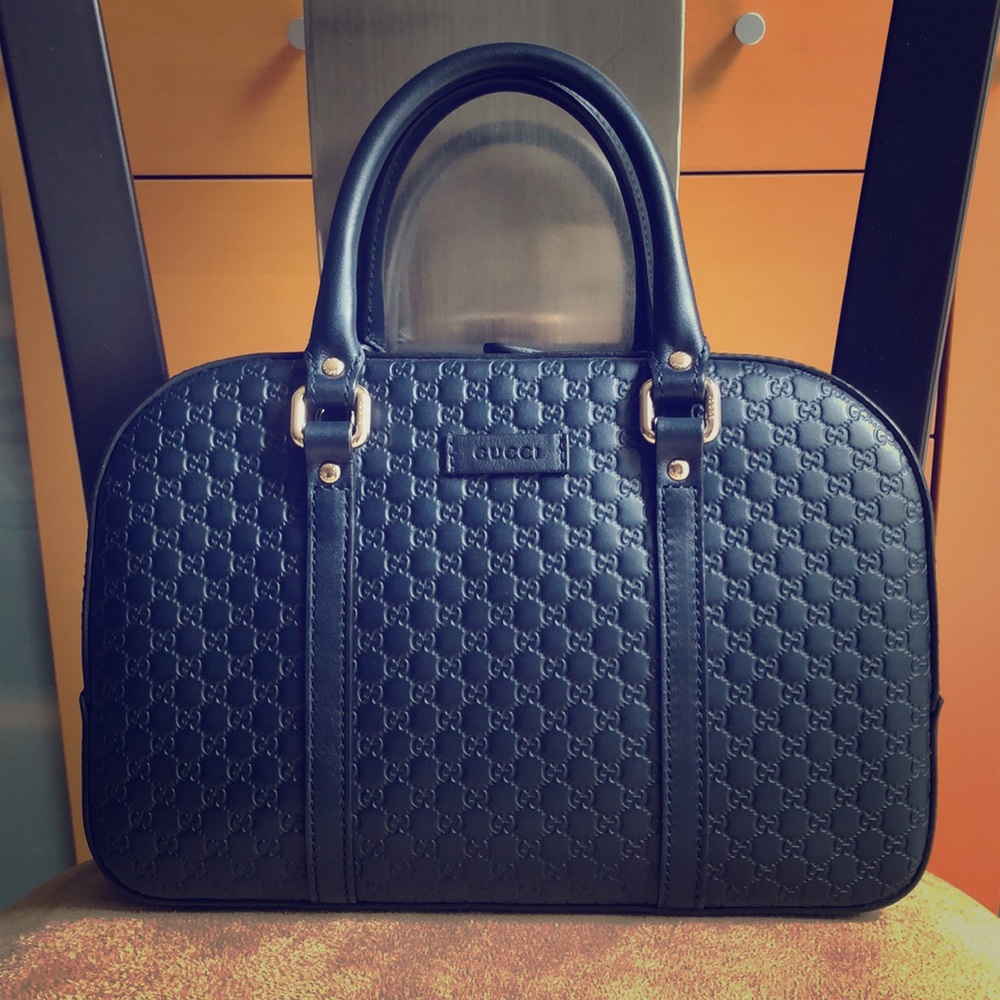 Gucci dark navy authentic leather handbag